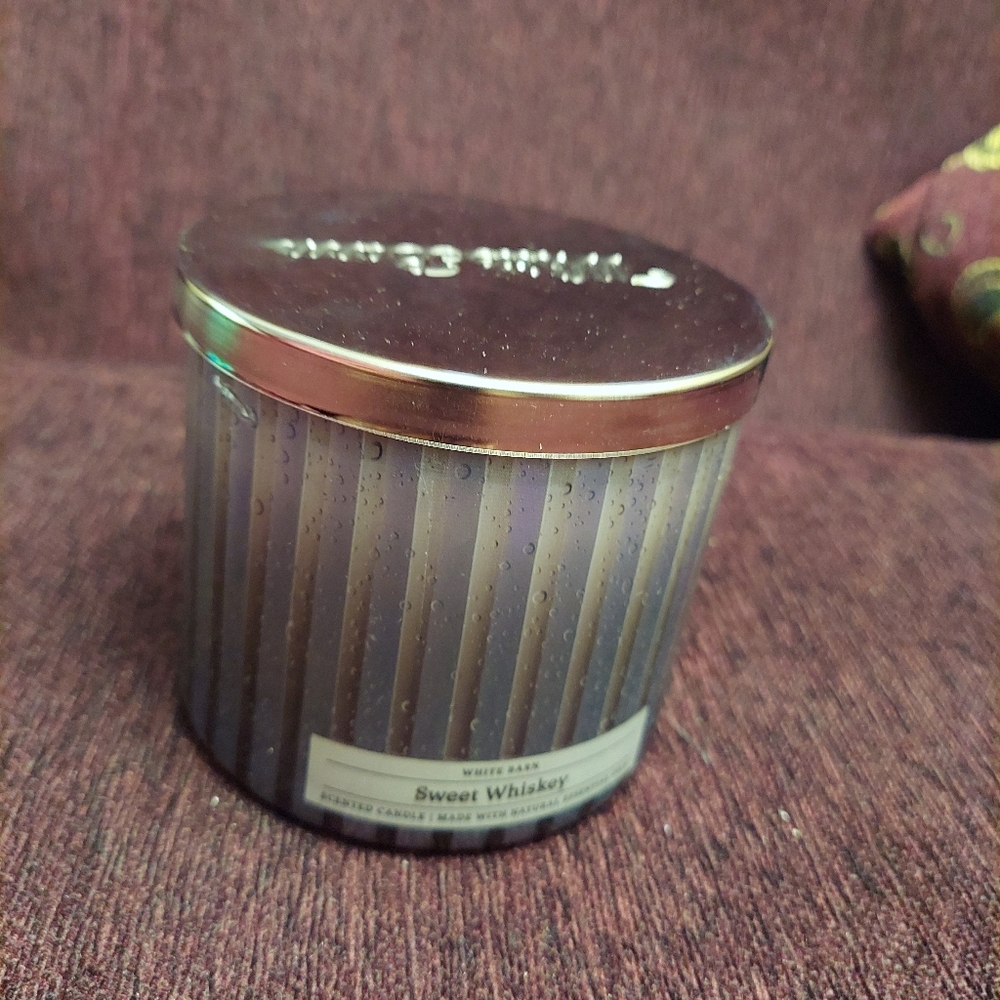 Sweet whiskey candle by bath and body works.
